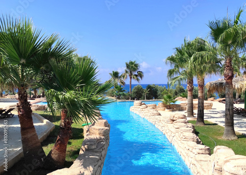 entertainment complex Sealanya Marine Park in Alanya, Turkey with a tropical river, palm trees, swimming pool, sand, views of the Mediterranean Sea and snorkeling photo