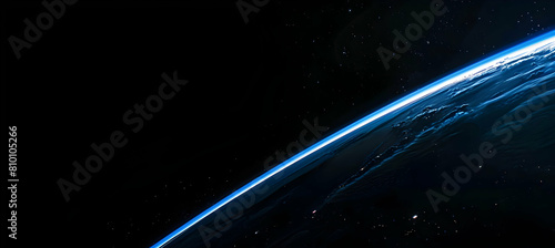 The thin blue line of Earth's atmosphere as seen from the exosphere, showcasing the curvature of the planet against the deep black of space photo