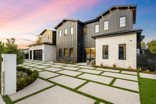 Картината върху платно Spacious House Surrounded by Green Grass