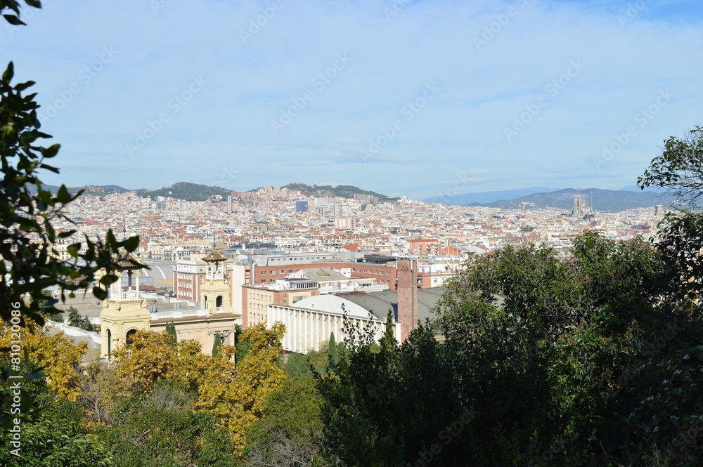 Obraz premium Panorama of Barcelona - urban development and historic buildings.,Catalan architecture, mountains and greenery, Spain