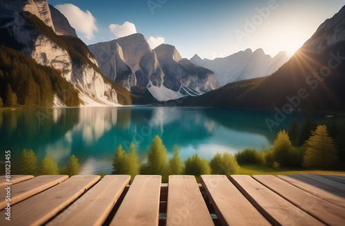 Landscape of Lake Braies, snowy mountains and blue lake, with a place to relax on the shore © Svetlana