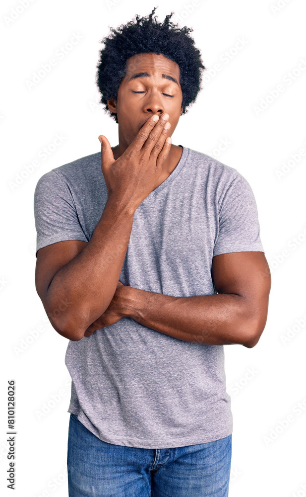 Handsome african american man with afro hair wearing casual clothes bored yawning tired covering mouth with hand. restless and sleepiness. Handsome african american man with afro hair wearing casual clothes bored yawning tired covering mouth with hand. restless and sleepiness.