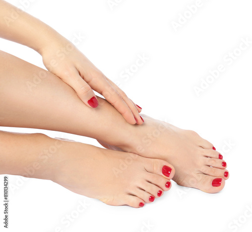 Woman with stylish red toenails after pedicure procedure isolated on white, closeup