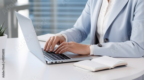 Female businesswoman boss accountant working in the office with modern laptop computer