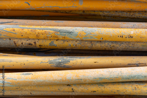 Abstract background of yellow iron pipes