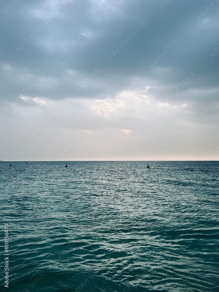 Fototapeta premium cloudy seascape, azure sea horizon