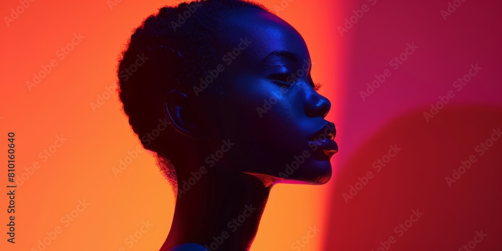 Striking portrait in blue and red light Striking portrait in blue and red light