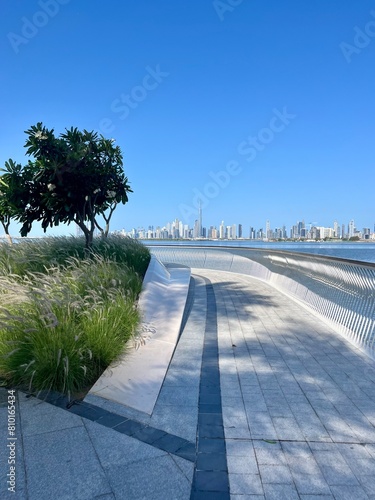 City riverside promenade, modern city promenade, downtown view 