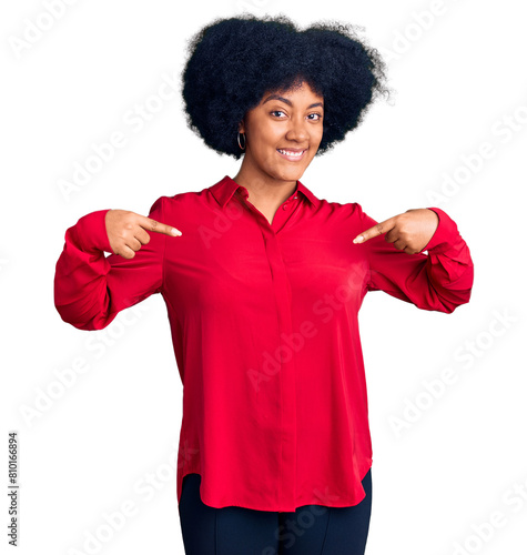 Young african american girl wearing casual clothes looking confident with smile on face, pointing oneself with fingers proud and happy.