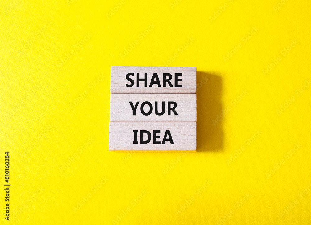 Share your Idea symbol. Concept words Share your Idea on wooden blocks. Beautiful yellow background. Business and Share your Idea concept. Copy space. Share your Idea symbol. Concept words Share your Idea on wooden blocks. Beautiful yellow background. Business and Share your Idea concept. Copy space.