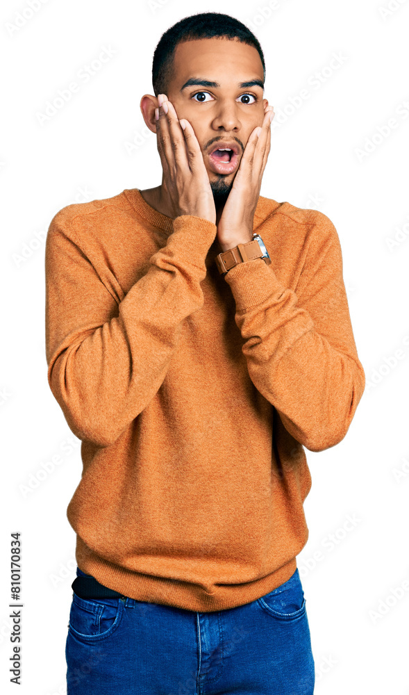 Φωτογραφία Young african american man wearing casual clothes afraid and shocked, surprise a