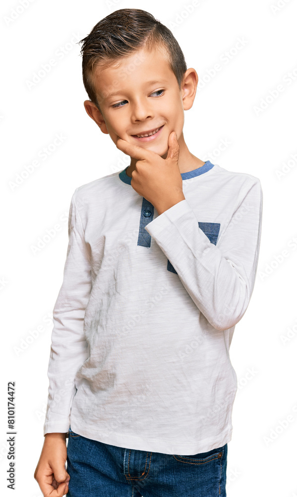 Adorable caucasian kid wearing casual clothes with hand on chin thinking about question, pensive expression. smiling with thoughtful face. doubt concept. Adorable caucasian kid wearing casual clothes with hand on chin thinking about question, pensive expression. smiling with thoughtful face. doubt concept.
