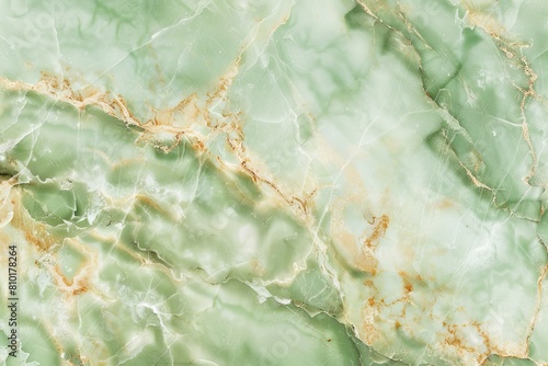 High-resolution image showcasing a luxurious green marble pattern with intricate gold veins. Perfect for background, wallpaper, or design projects that require an opulent and natural stone texture