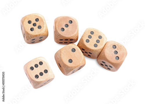 Many wooden game dices isolated on white  above view