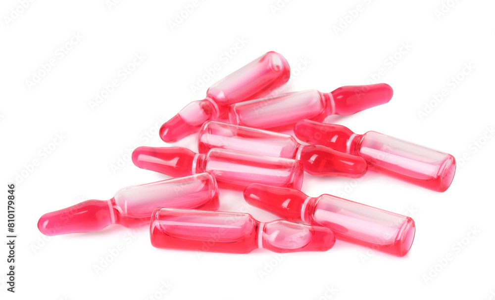 Glass ampoules with liquid isolated on white, above view Glass ampoules with liquid isolated on white, above view