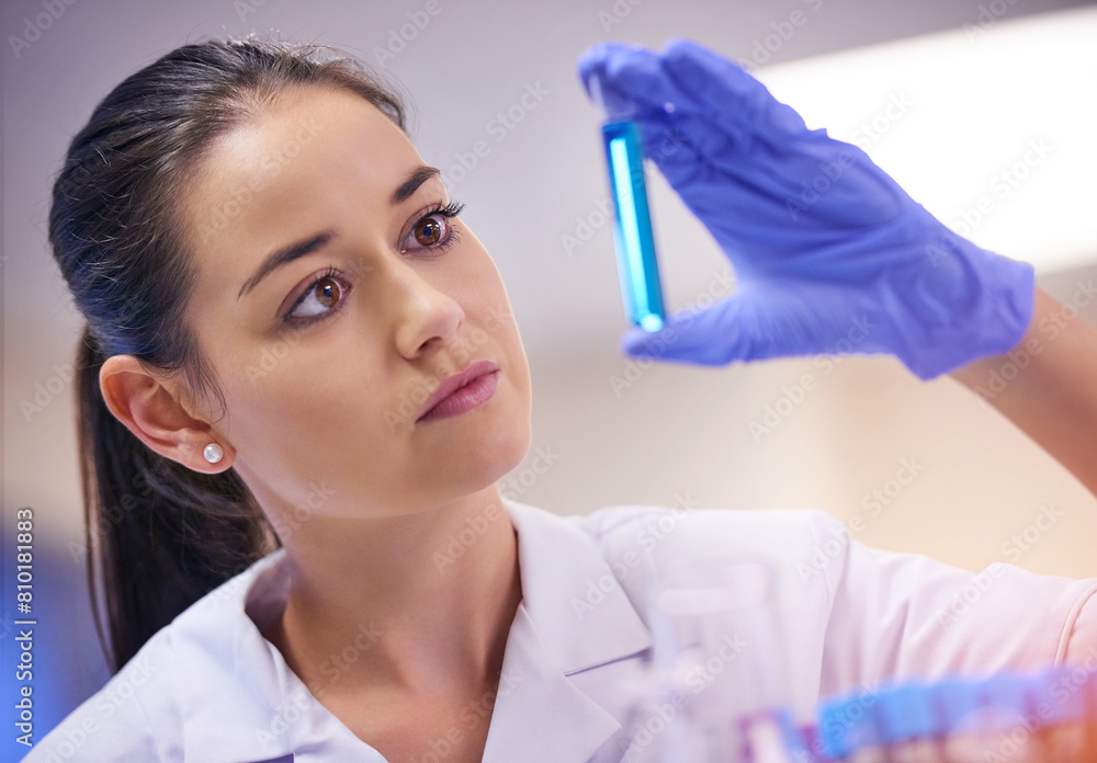 Liquid vaccine, woman and scientist with test tube in laboratory for investigation, research or virus testing. Pharmaceutical, medicine and lab technician for analysis, experiment or medical study Liquid vaccine, woman and scientist with test tube in laboratory for investigation, research or virus testing. Pharmaceutical, medicine and lab technician for analysis, experiment or medical study