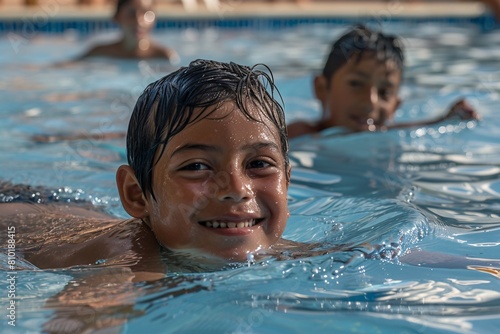Blissful moment as children enjoy a refreshing swim in the pool