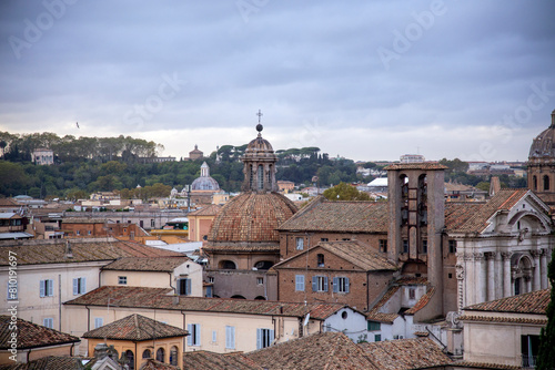 View of the roofs and historical overlays of Rome, towards the Gianicolo hill, Rome, Italy