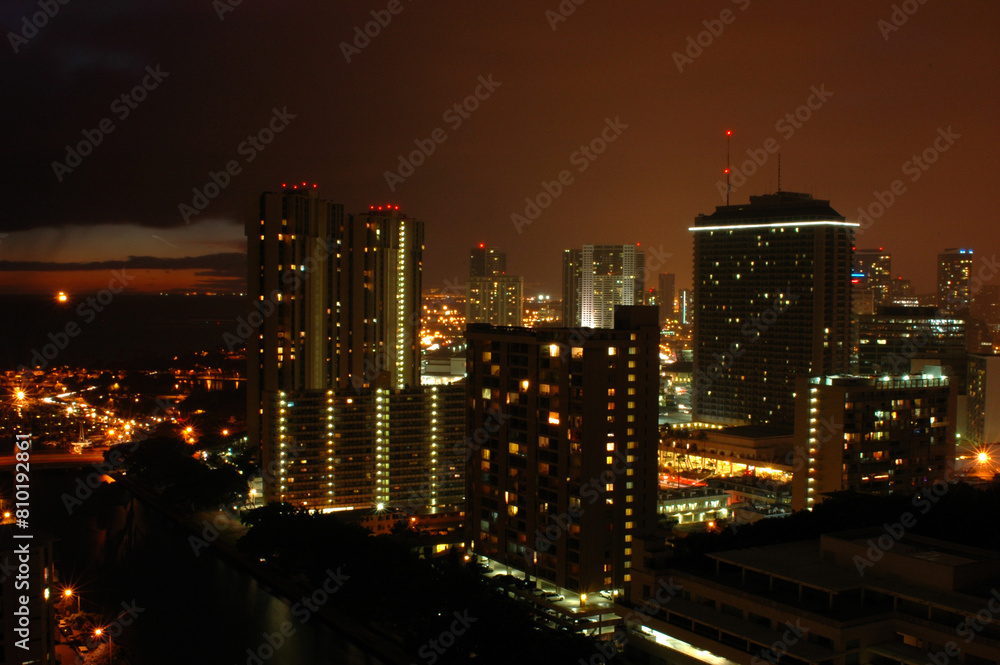 City nightscape with illuminated skyscrapers