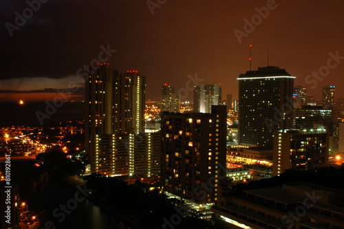 City nightscape with illuminated skyscrapers
