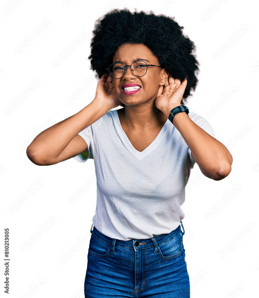 Young african american woman wearing casual white t shirt trying to hear both hands on ear gesture, curious for gossip. hearing problem, deaf Young african american woman wearing casual white t shirt trying to hear both hands on ear gesture, curious for gossip. hearing problem, deaf