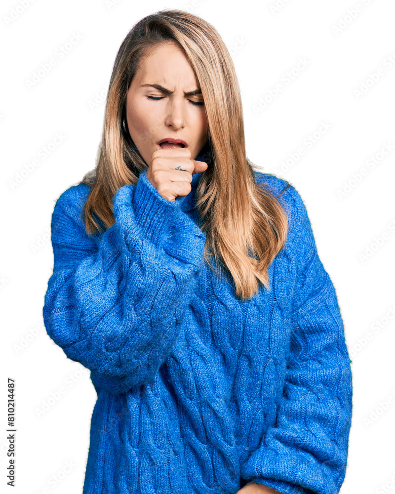 Young blonde woman wearing casual sweater feeling unwell and coughing as symptom for cold or bronchitis. health care concept. Young blonde woman wearing casual sweater feeling unwell and coughing as symptom for cold or bronchitis. health care concept.