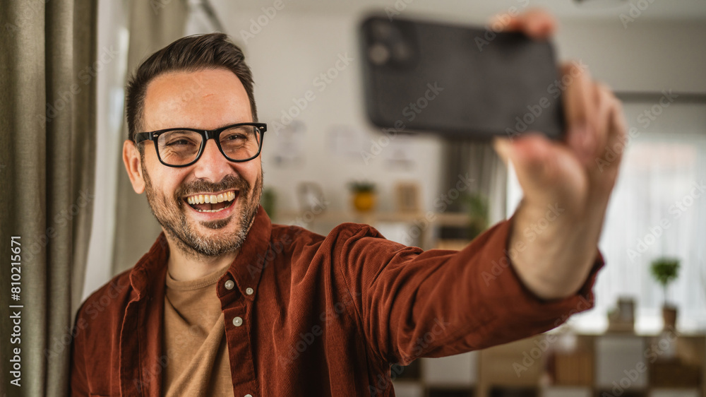 Portrait of adult caucasian man take a self portrait at home Portrait of adult caucasian man take a self portrait at home
