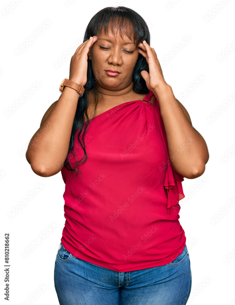 Hispanic middle age woman wearing casual clothes suffering from headache desperate and stressed because pain and migraine. hands on head. Hispanic middle age woman wearing casual clothes suffering from headache desperate and stressed because pain and migraine. hands on head.
