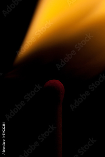 Match on background of flame