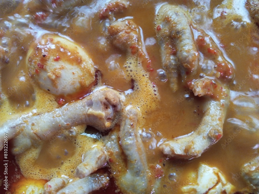 Ready to eat. Chicken feet and spicy egg rendang sauce or Ready to eat. Chicken feet and spicy egg rendang sauce or