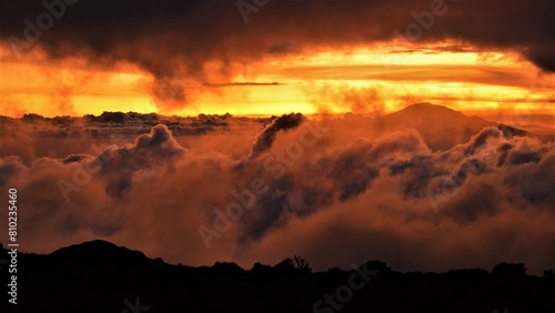Silhouette of Mount Meru, a dormant stratovolcano and the second highest mountain in Tanzania (4562 m), as observed at dusk from the vicinity of Shira Camp on Mount Kilimanjaro (Tanzania, Africa) photo