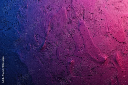 A purple and blue wall with a textured surface. The wall is painted in a gradient of purple and blue, with the purple being more dominant. The wall has a rough texture, giving it a rugged appearance
