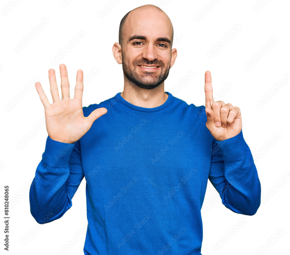 Young hispanic man wearing casual clothes showing and pointing up with fingers number six while smiling confident and happy. Young hispanic man wearing casual clothes showing and pointing up with fingers number six while smiling confident and happy.