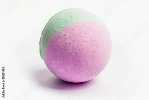 Bath bomb isolated on a white background. Fresh, clean look of a spherical bath accessory. Concept of spa, relaxation, hygiene, freshness, wellness and personal care.