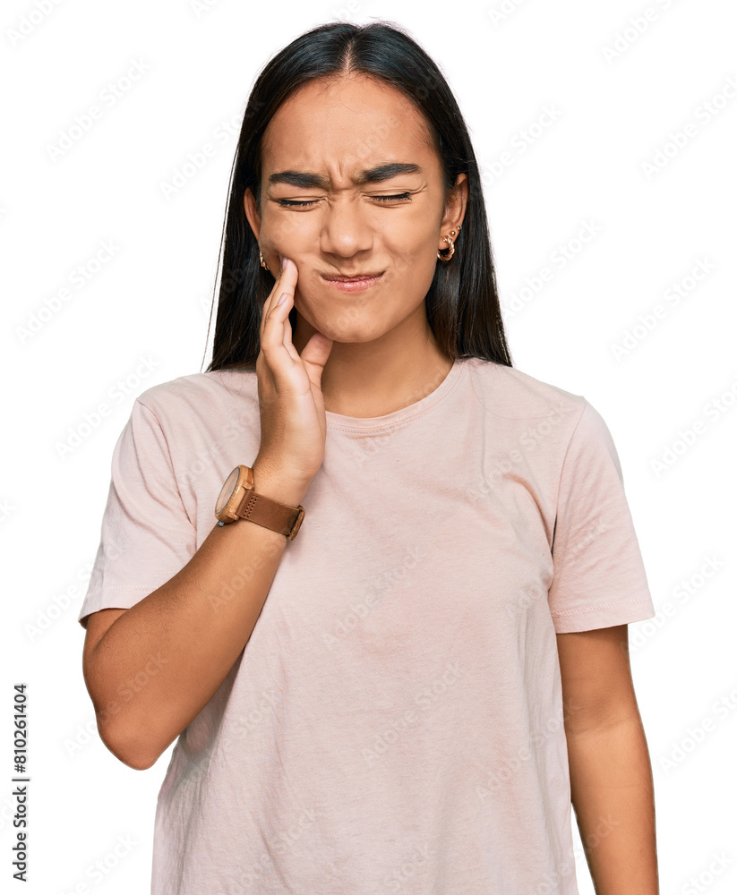 Young asian woman wearing casual clothes touching mouth with hand with painful expression because of toothache or dental illness on teeth. dentist Young asian woman wearing casual clothes touching mouth with hand with painful expression because of toothache or dental illness on teeth. dentist
