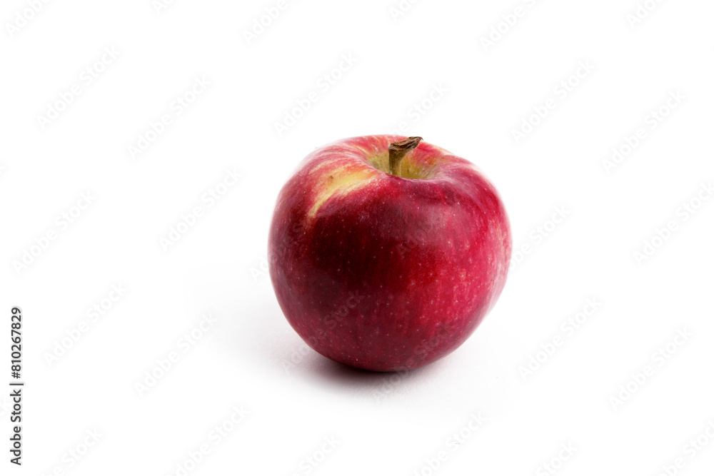 a single red Cortland or Mcintosh apple isolated on white a single red Cortland or Mcintosh apple isolated on white