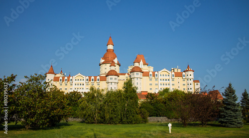 Sochi, Krasnodar Territory, Russia - August 3, 2023: a fabulous castle in Sochi park among green trees on a sunny summer day