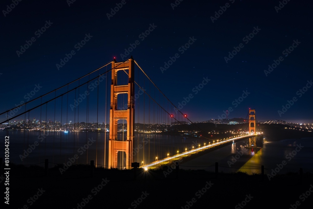 Illuminated golden gate bridge at night