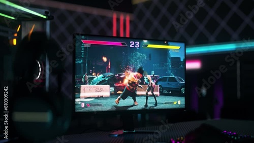 Playing the modern melee battle game on the pc screen. Animation of the powerful fighters on the gaming pc screen. Knock out screen after the round of the action fight pc game. Victory. Hobby. photo