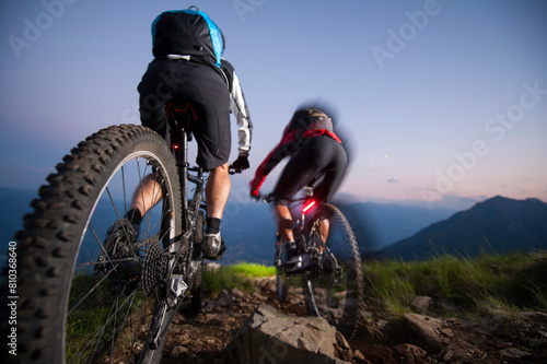 Mountain biking adventure at dusk
