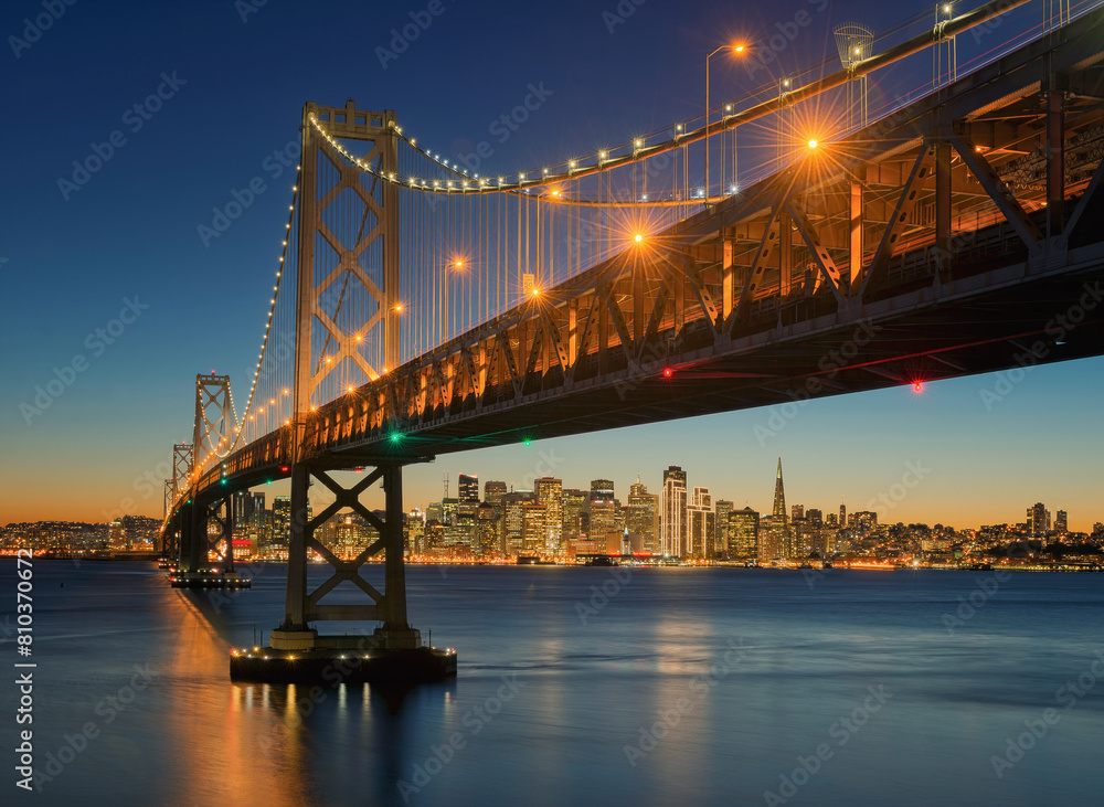 San francisco skyline and bay bridge at twilight