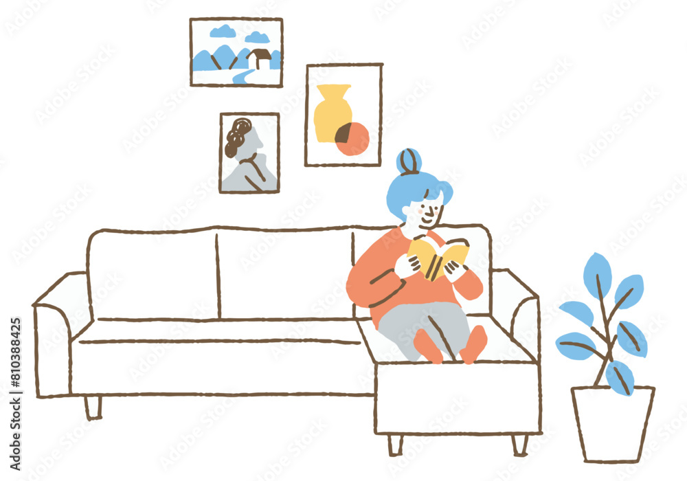 Woman reading a book on the living room sofa_Color