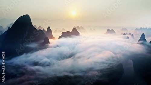 Aerial view of karst mountain and clouds natural landscape at sunrise in Guilin. Spectacular mountain range natural landscape in China. photo