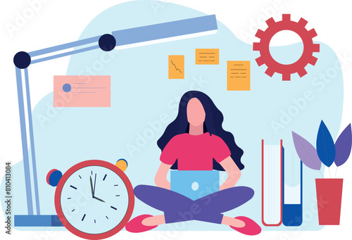 The girl is reading on her laptop.