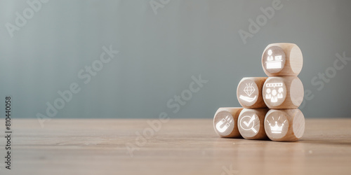 Foto Employer branding concept, Wooden block on desk with employer branding icon on virtual screen