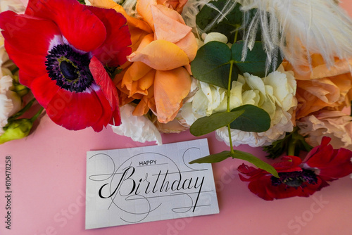 postcard , Internet banner  with a birthday greeting, with the inscription - happy birthday,  a bouquet of flowers with a note of congratulations