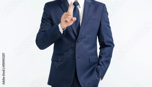 Craft an image of a male CEO in a navy blue business suit, visible from the torso up, with a finger gesturing commandingly photo