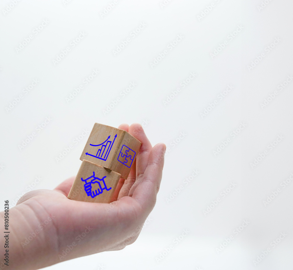 hand hold wood cubes show corporate, contract, growth sign hand hold wood cubes show corporate, contract, growth sign
