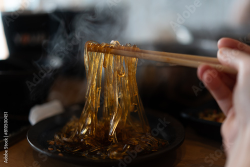 hot cooked glass noodle shabu with chopsticks
