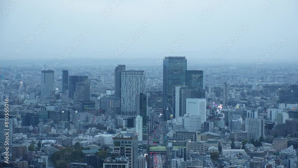 SHIBUYA, TOKYO, JAPAN - APRIL 2024 : Aerial high angle view of Shibuya city in sunset. View of tall buildings at busy downtown area. SHIBUYA, TOKYO, JAPAN - APRIL 2024 : Aerial high angle view of Shibuya city in sunset. View of tall buildings at busy downtown area.
